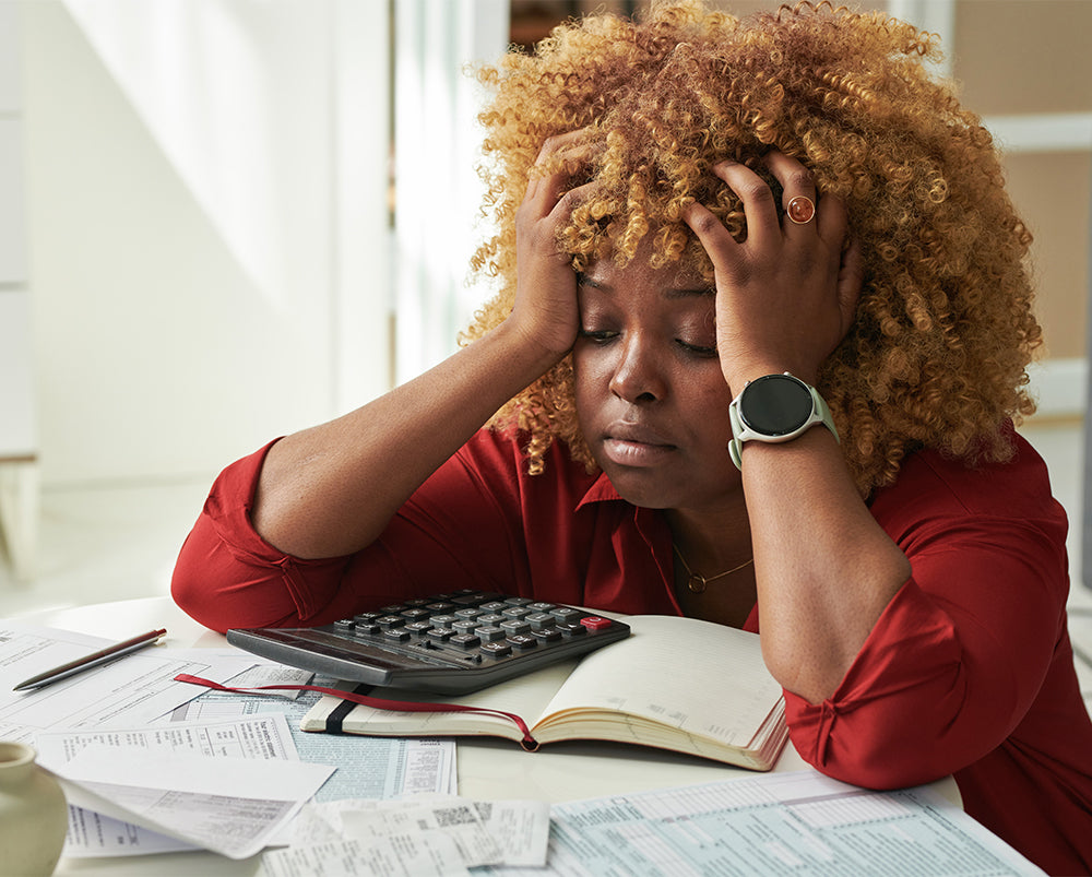 Woman-tired-her-bills-chronic-stress-impacts-ageing-and-longevity