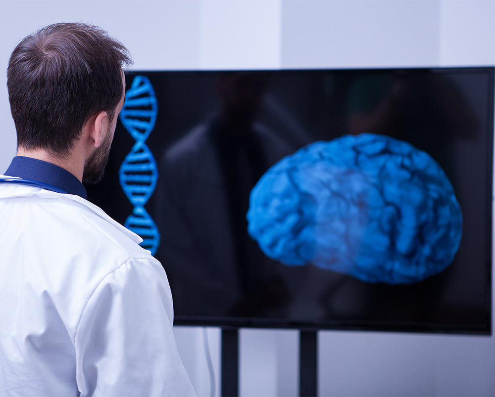 MND-Motor-Neurone-Disease-doctor-lloking-at-3d-brain-and-dna-image-on-tv