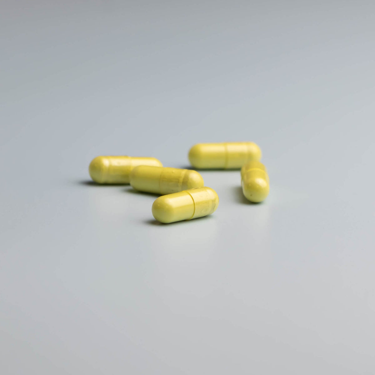 NMNsify-Quercetin-UK-Quercetin-supplement-Sophora-Japonica-L.-800mg-capsules-grey-background